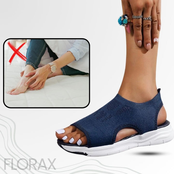 Florax ortopædiske sandaler fra siden, der fremhæver fodbuestøtte og dæmpning.