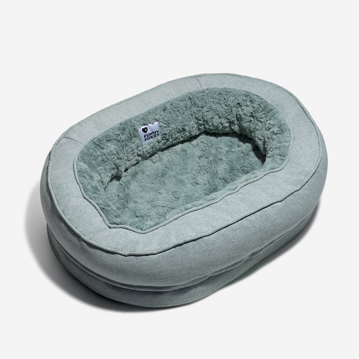 Ortopædisk fluffy kæledyrsseng i donutform, beige, til hunde, tilbyder komfort og støtte på glatte gulve.