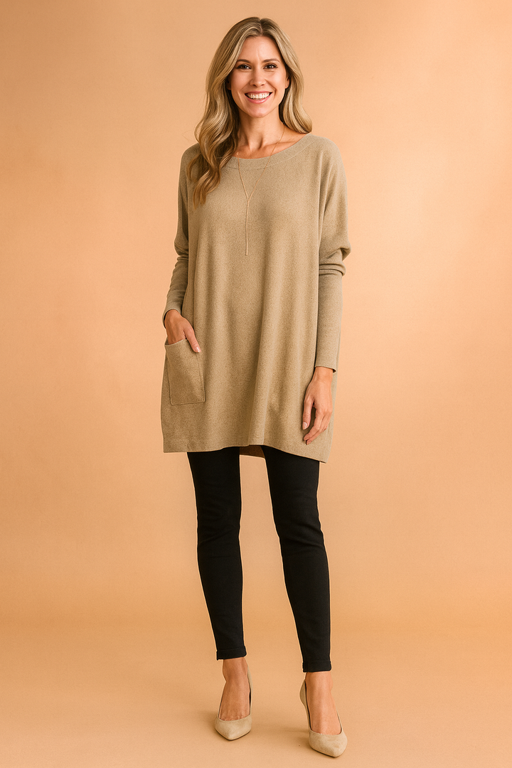 Elegant overdimensioneret sweater til kvinder med praktiske lommer. Stilfuld og komfortabel dametrøje.