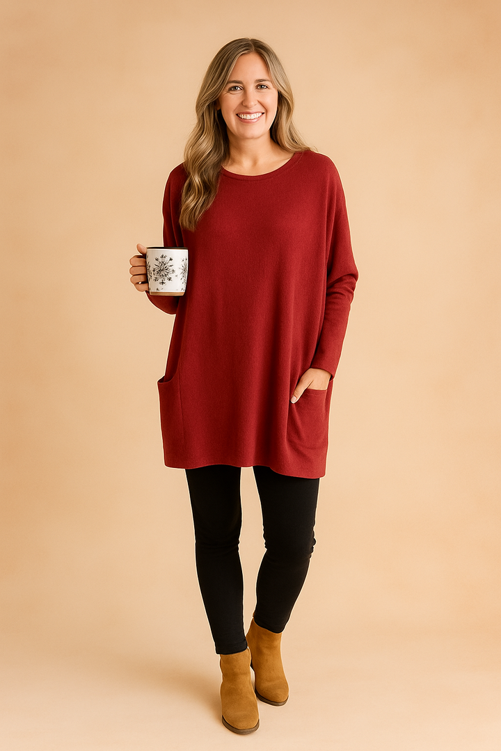 Modebevidst oversized dametrøje med rummelige lommer. Ultimativ komfort for en afslappet hverdagsstil.