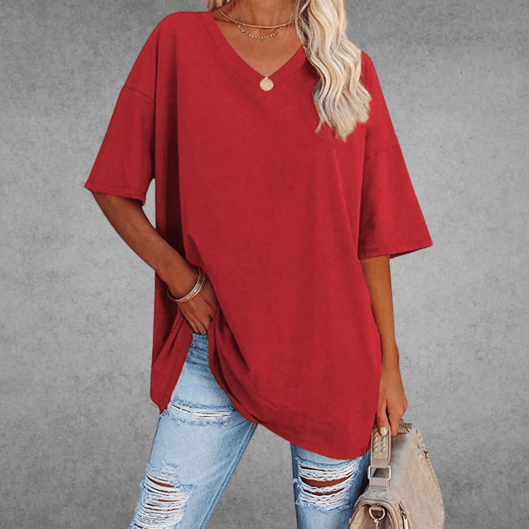 Chic og trendy oversized V-hals T-shirt for moderne damer. Perfekt til enhver sæson.