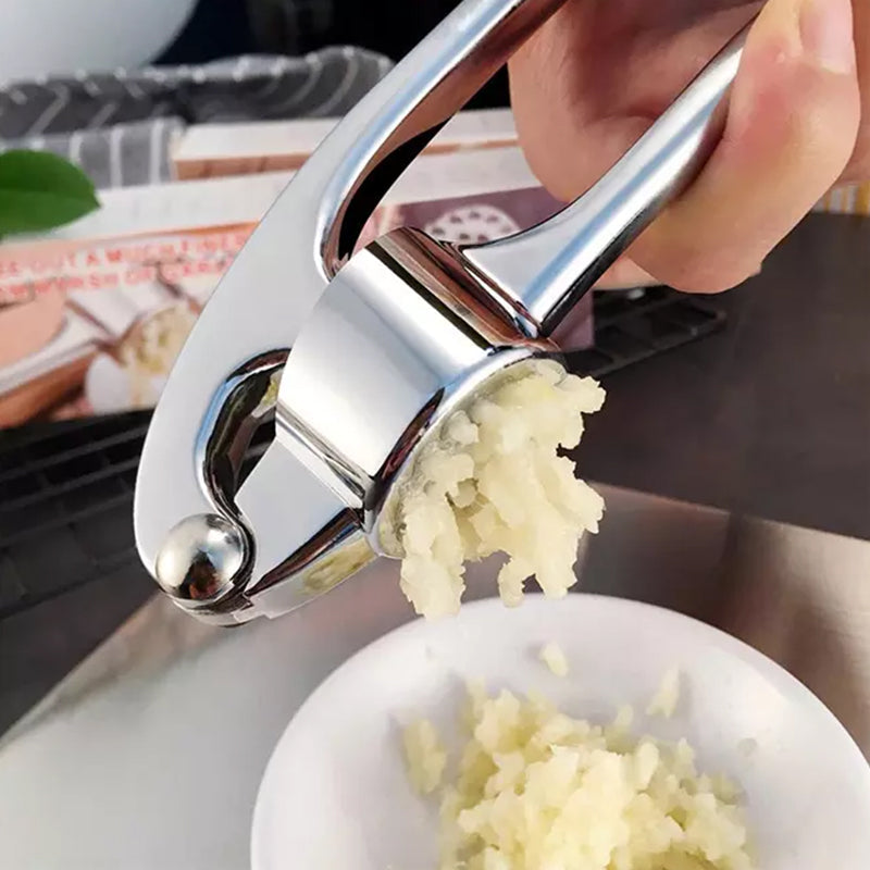 Premium hvidløgspresser i rustfrit stål, robust, ergonomisk, ubesværet hvidløgsknusning, ideel køkkenhjælp.