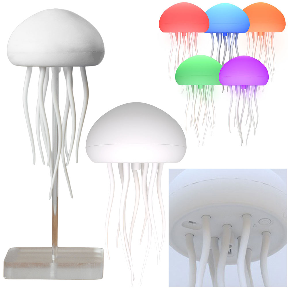 Meduse natlampe med justerbar belysning, blide farver og medusebevægelse, der skaber en afslappende havstemning.