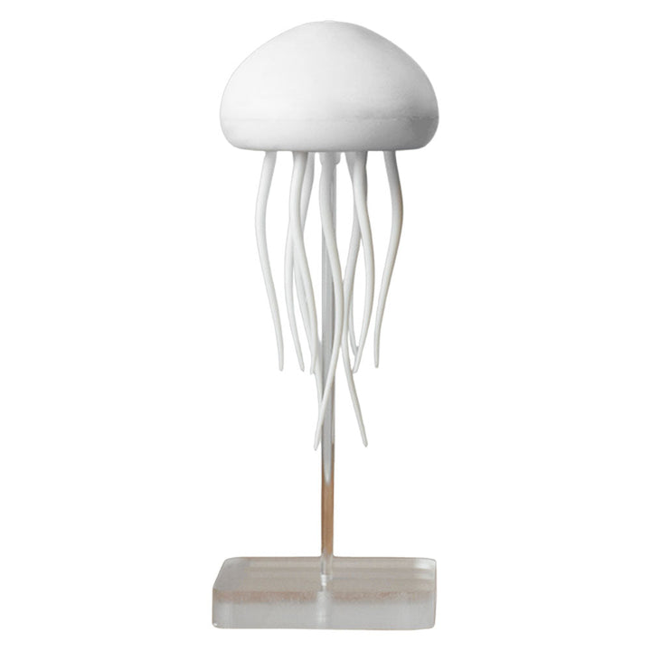 Meduse natlampe med justerbar belysning, blide farver og medusebevægelse, der skaber en afslappende havstemning.