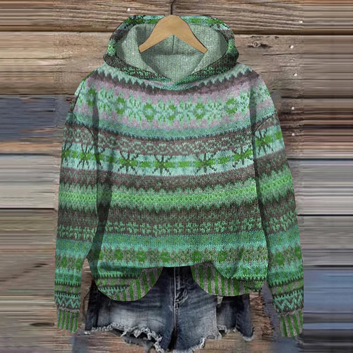 Kvinders retro vintersweater i et stilfuldt design. En varm og moderne sweater, ideel til koldt vejr og hygge.
