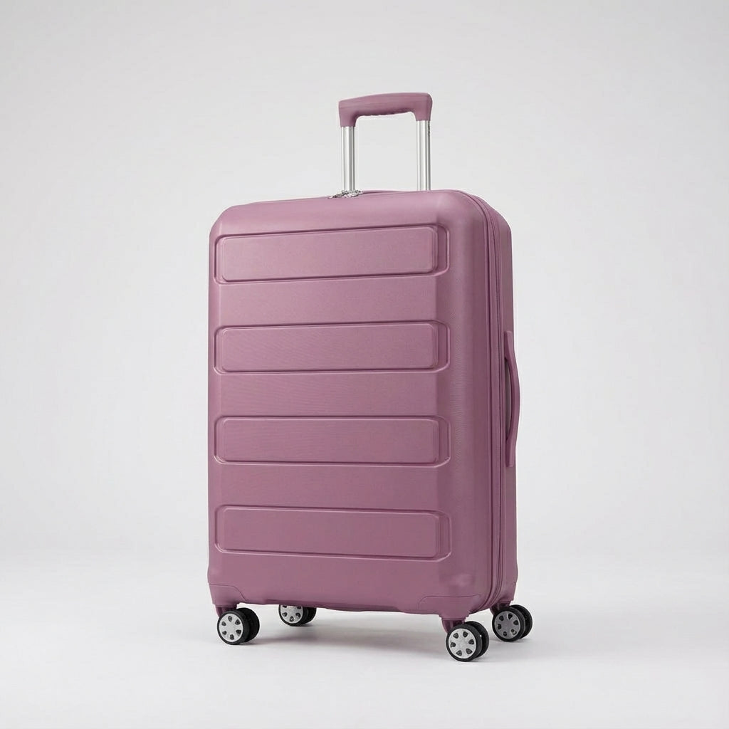 Moderne udvidelig spinnerkuffert med USB-opladning og robust skal for nem transport.