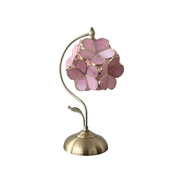 Tiffany bordlampe med farvet glas blomster, justerbar højde og en solid bronze fod for stabil belysning.