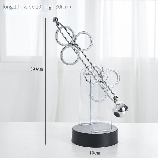 Roterende evighedspendel, dekorativt ornament med elegant dobbelt-trippelring design, lydløst og hypnotisk.