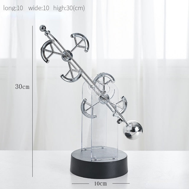 Roterende evighedspendel, dekorativt ornament med elegant dobbelt-trippelring design, lydløst og hypnotisk.