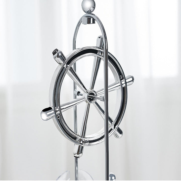 Roterende evighedspendel, dekorativt ornament med elegant dobbelt-trippelring design, lydløst og hypnotisk.