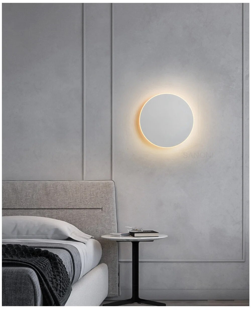 Rund, moderne LED-væglampe med elegant, minimalistisk design, ideel til stilfuld indendørsbelysning.