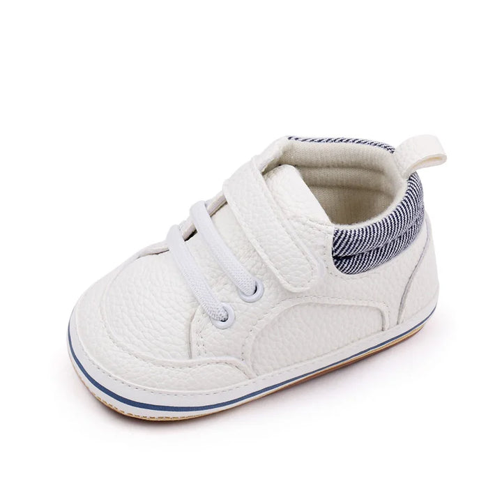 Skridsikre babysko med velcro i blå, blød sål, ideel til de første skridt, fleksibel og åndbar.