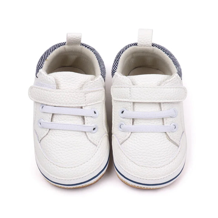 Skridsikre babysko med velcro i blå, blød sål, ideel til de første skridt, fleksibel og åndbar.