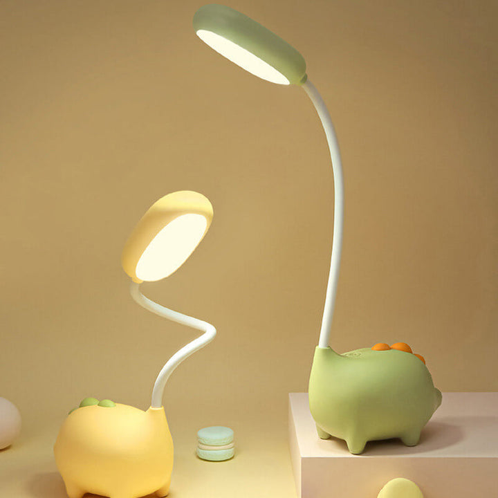 Sandsberg LED-bordlampe i dinosaurform, øjenvenlig, genopladelig, ideel til børneværelset.