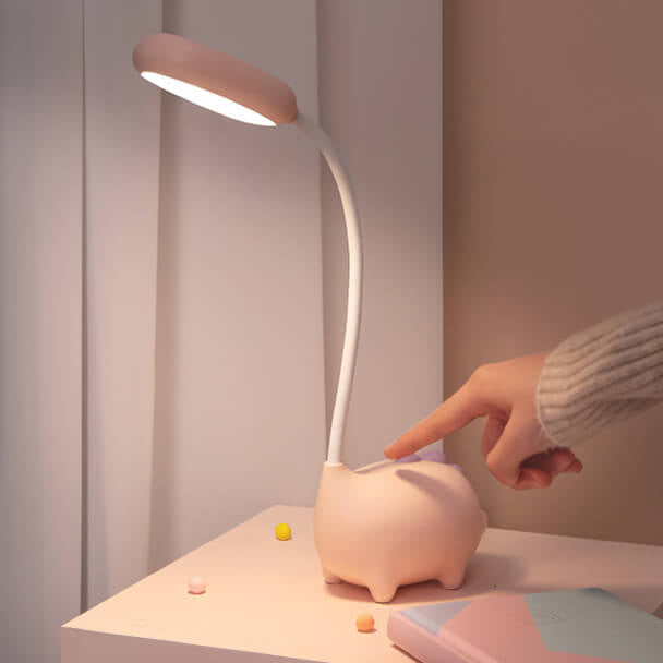 Sandsberg LED-bordlampe i dinosaurform, øjenvenlig, genopladelig, ideel til børneværelset.