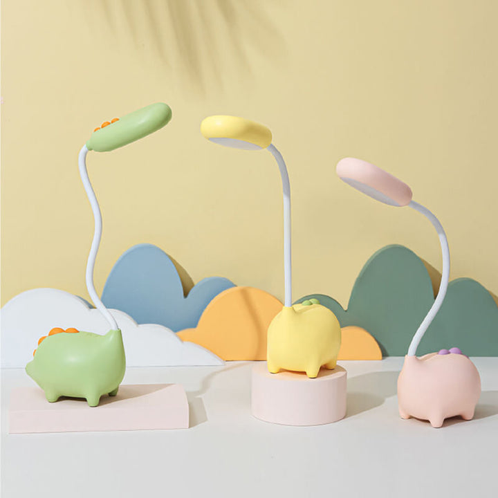 Sandsberg LED-bordlampe i dinosaurform, øjenvenlig, genopladelig, ideel til børneværelset.