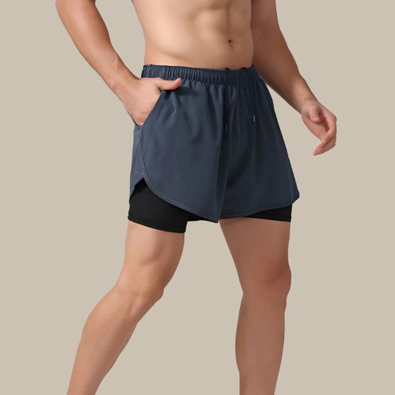 Herre hurtigtørrende løbeshorts, lette, åndbare, med mesh-paneler og lynlåslomme, ideelle til sport.