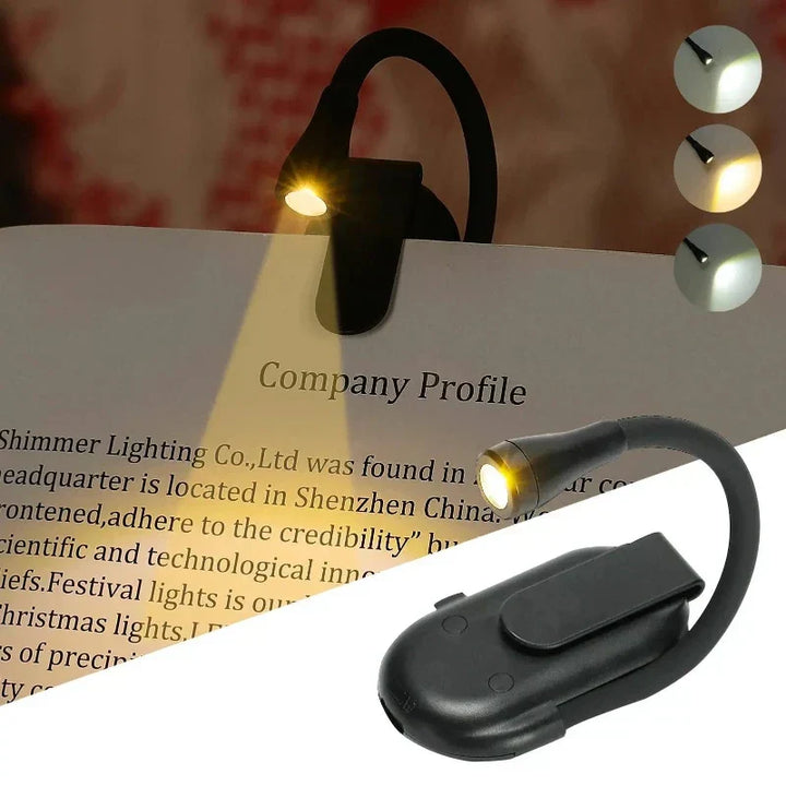 Sort, fleksibel læselampe med 360° rotation og genopladelig bogklemme samt dæmpbare LED'er, ideel til læsning.