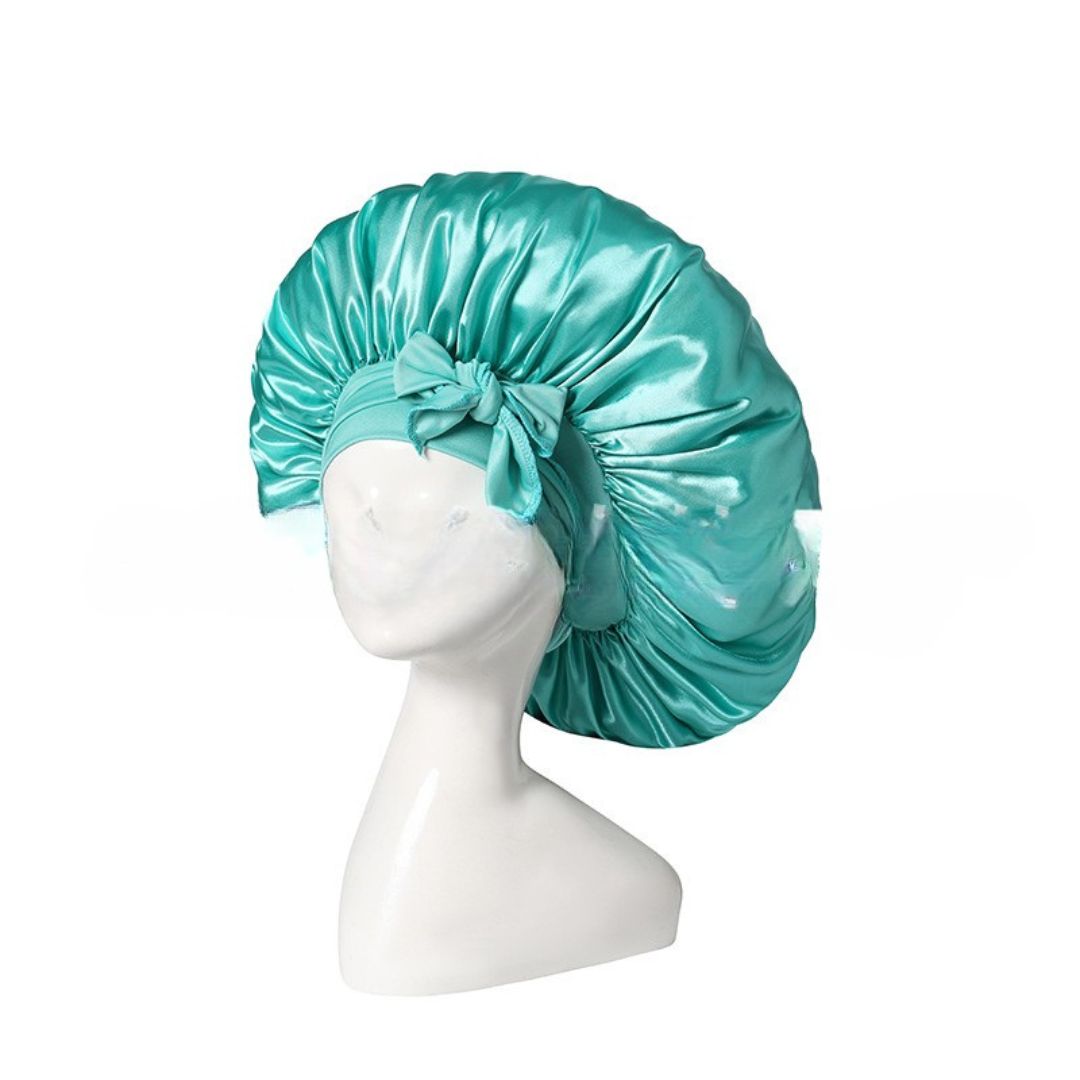 Silke sovehætte til hårpleje, der sikrer frizzfrit hår og luksuriøs sovekomfort, med et stilfuldt design.