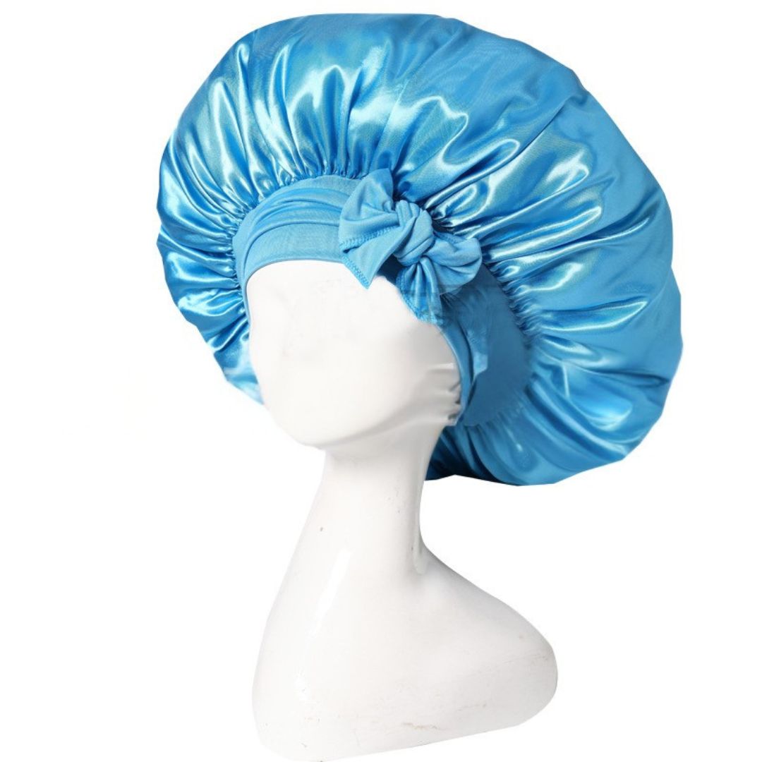 Silke sovehætte til hårpleje, der sikrer frizzfrit hår og luksuriøs sovekomfort, med et stilfuldt design.