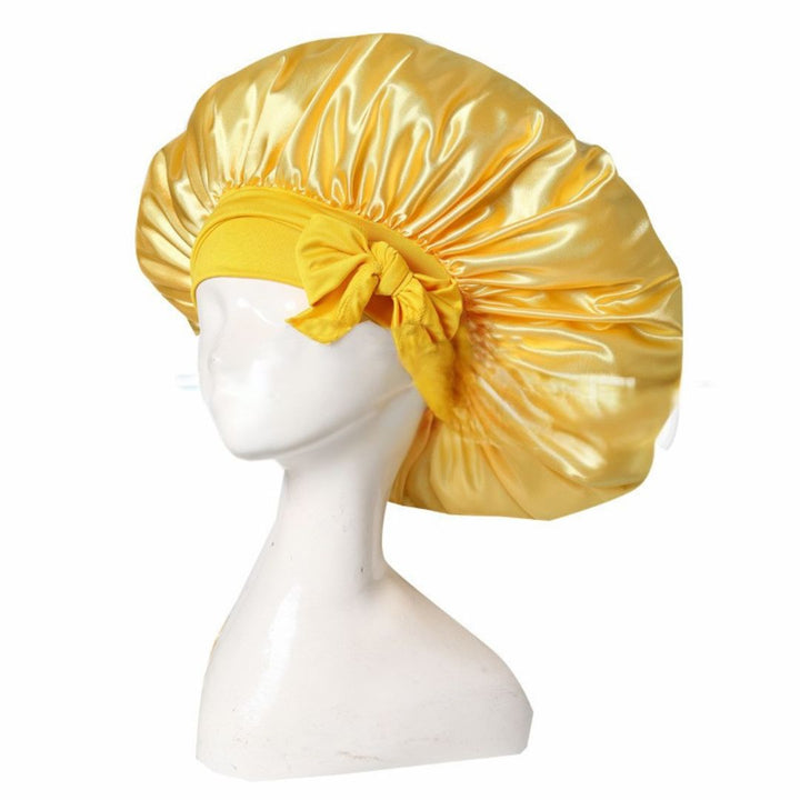 Silke sovehætte til hårpleje, der sikrer frizzfrit hår og luksuriøs sovekomfort, med et stilfuldt design.