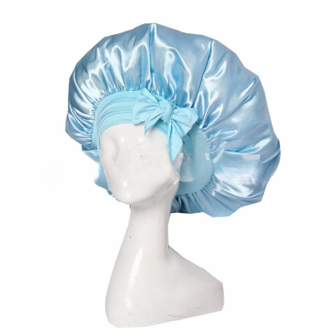 Silke sovehætte til hårpleje, der sikrer frizzfrit hår og luksuriøs sovekomfort, med et stilfuldt design.