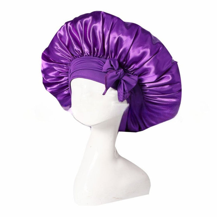 Silke sovehætte til hårpleje, der sikrer frizzfrit hår og luksuriøs sovekomfort, med et stilfuldt design.