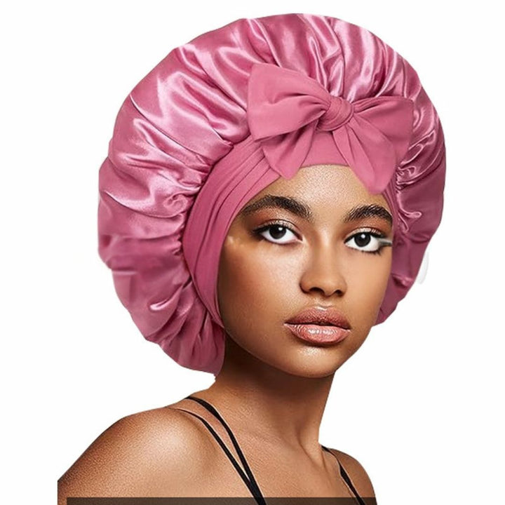 Silke sovehætte til hårpleje, der sikrer frizzfrit hår og luksuriøs sovekomfort, med et stilfuldt design.
