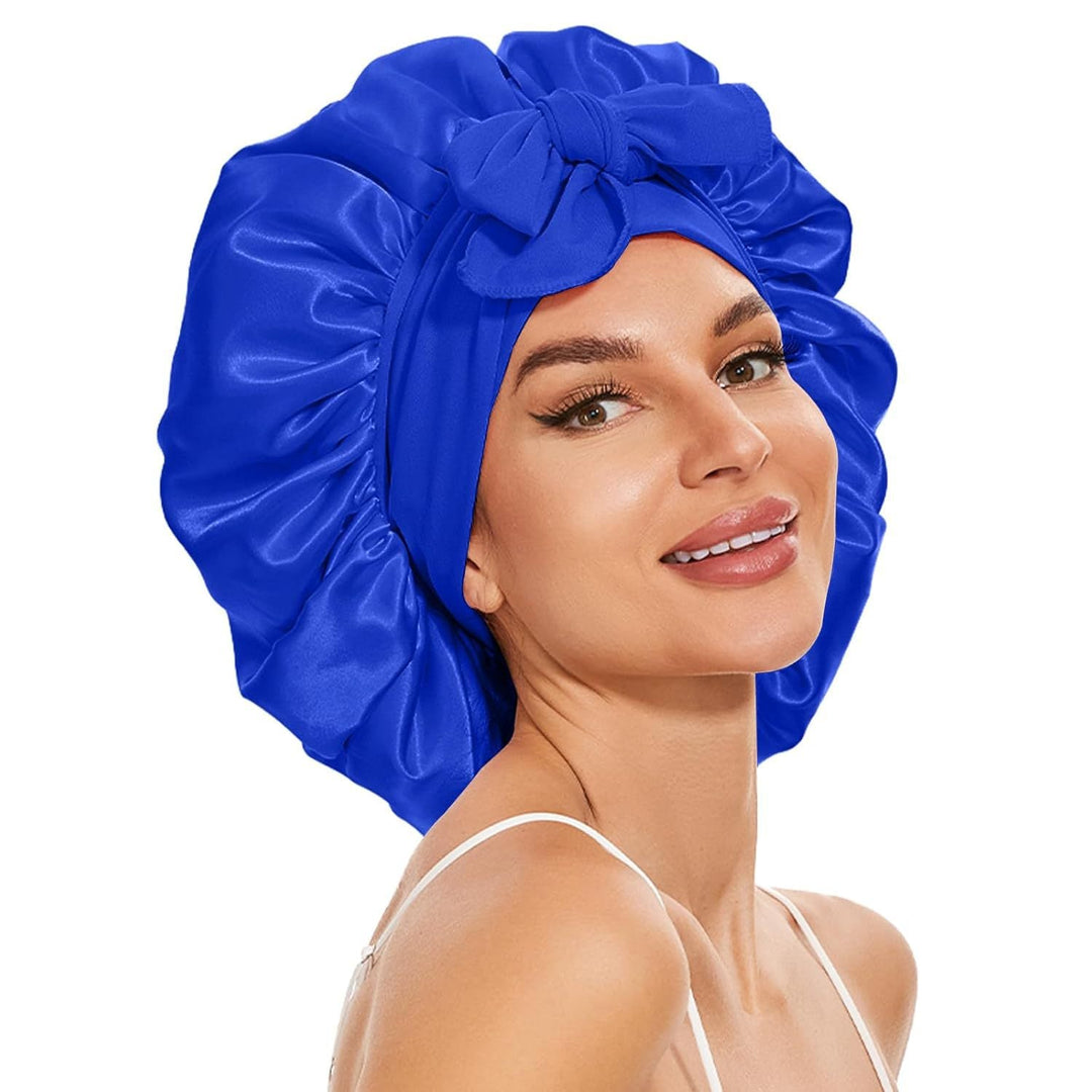 Silke sovehætte til hårpleje, der sikrer frizzfrit hår og luksuriøs sovekomfort, med et stilfuldt design.