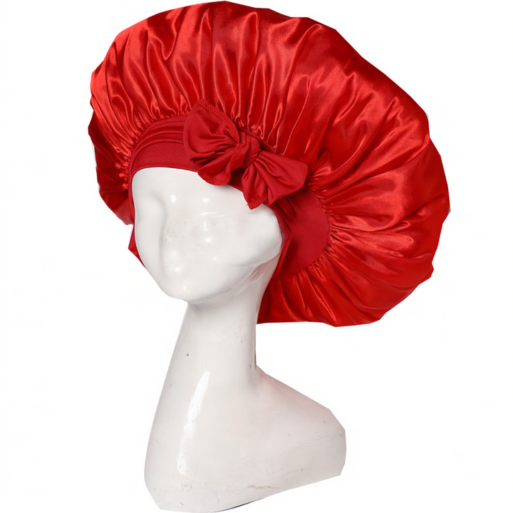 Silke sovehætte til hårpleje, der sikrer frizzfrit hår og luksuriøs sovekomfort, med et stilfuldt design.