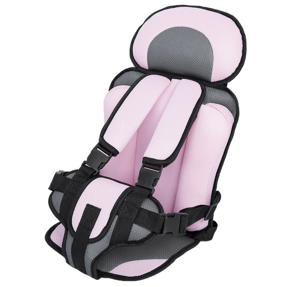 Grå autostol med justerbar 5-punktssele og ISOFIX for sikker montering i bil.