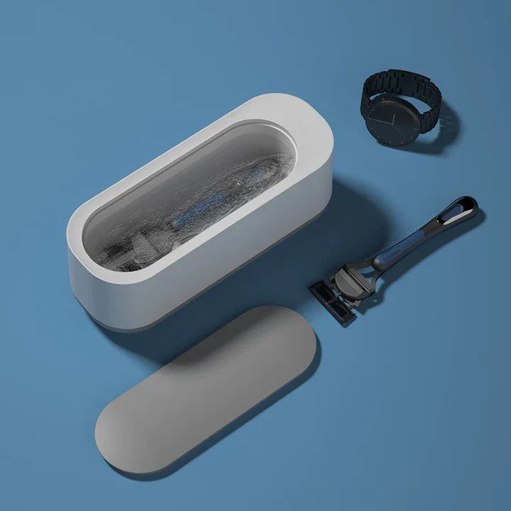 Kraftfuld smart ultralydsrenser til grundig rengøring af smykker, briller, mønter og små elektronikdele.