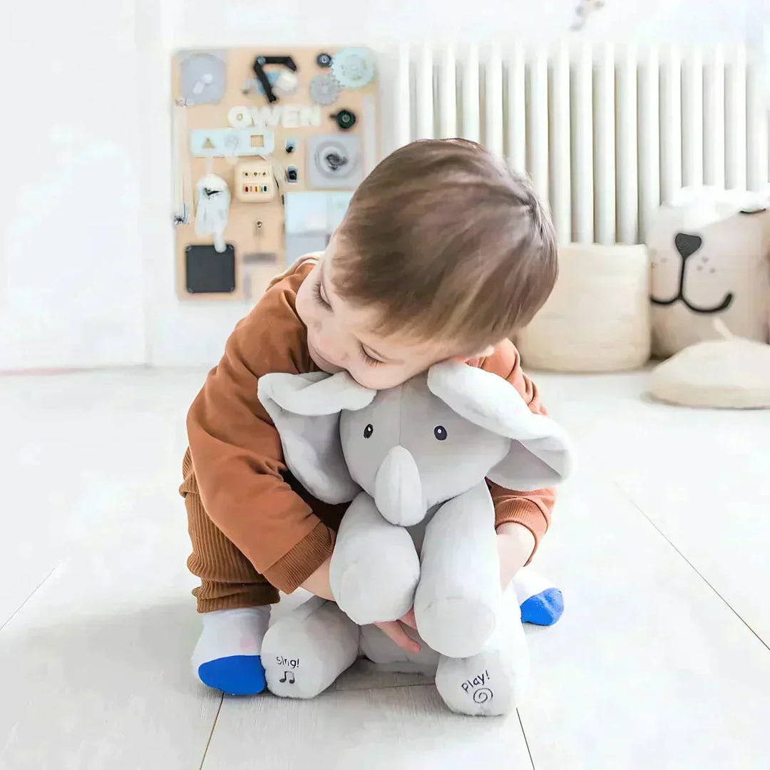 Interaktiv syngende elefant bamse til børn med bevægelige ører. Perfekt plysdyr til leg.