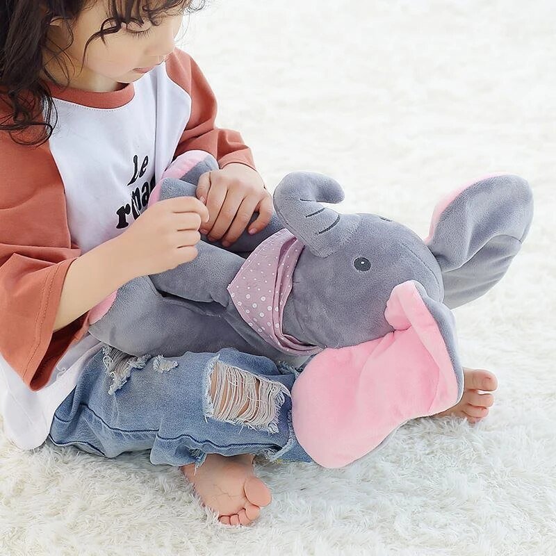 Børns interaktive elefant bamse synger og leger. Et blødt plysdyr til indendørs sjov.