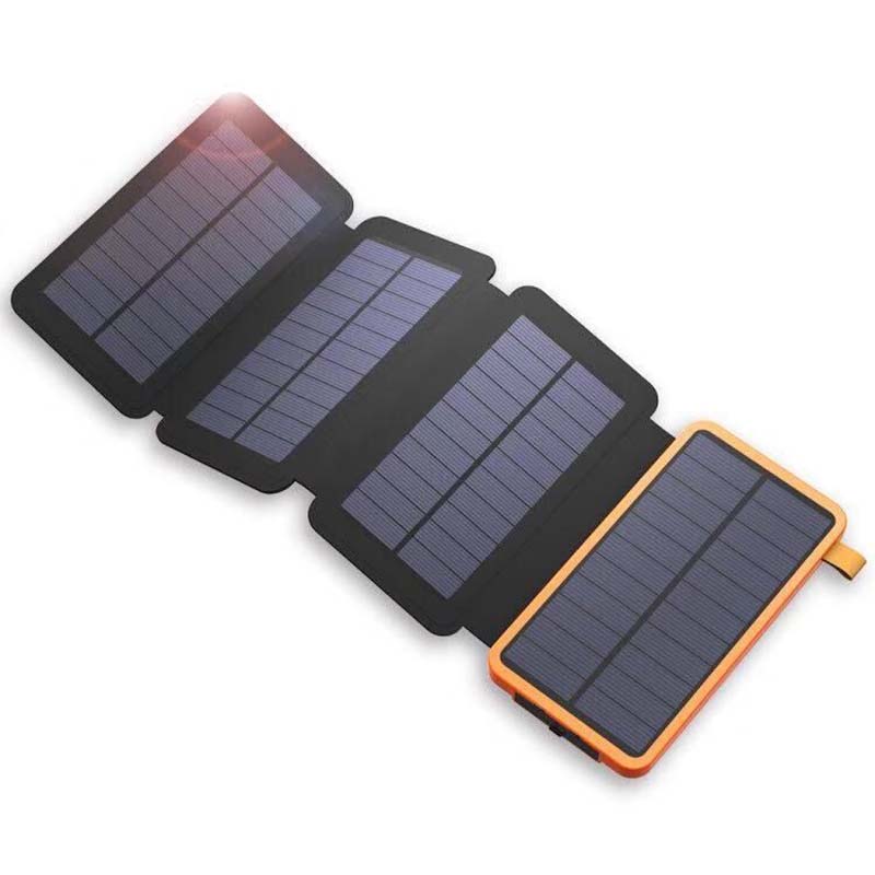 Solcelledrevet powerbank 25000mAh med fire solpaneler, LED'er, robust design til udendørs eventyr og hurtig opladning.