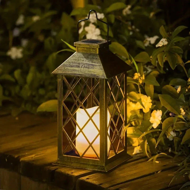 Solarlampe Noctis Have Lantern med flimrende LED-lys, varmt skær, vejrbestandig, ideel til havebelysning.