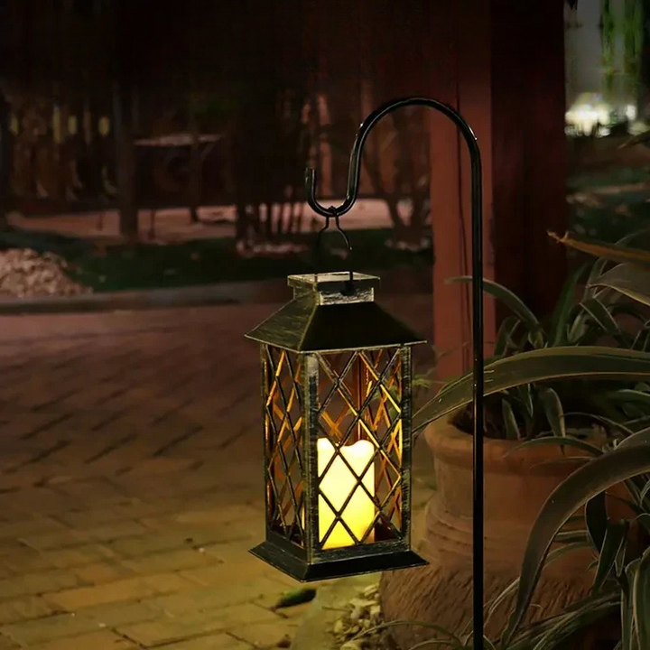 Solarlampe Noctis Have Lantern med flimrende LED-lys, varmt skær, vejrbestandig, ideel til havebelysning.