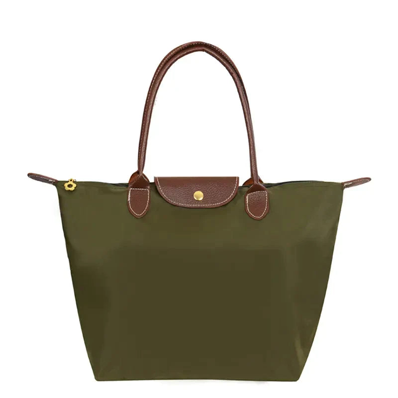 Trendy kvalitetshåndtaske til damer. Funktionel shopper taske i moderne design til enhver lejlighed.