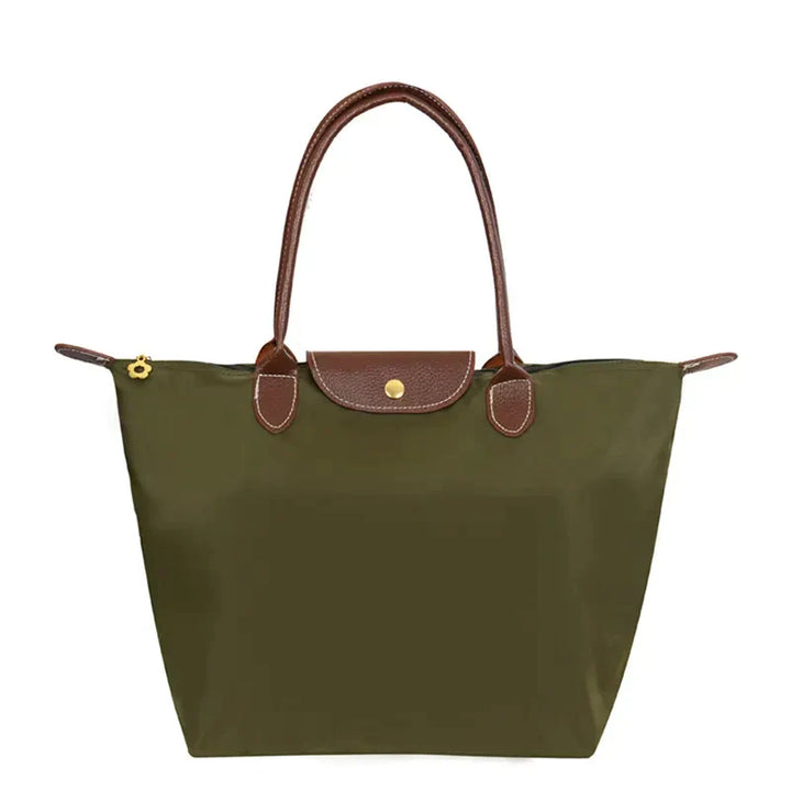 Trendy kvalitetshåndtaske til damer. Funktionel shopper taske i moderne design til enhver lejlighed.