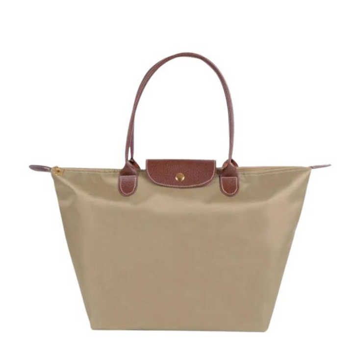Kaffe farvet elegant kvindehåndtaske. Stilfuld shopper, perfekt som trendy mode accessory.