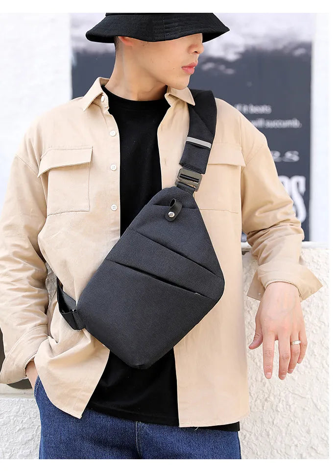 Unisex hverdagstaske: Grå mini crossbody med justerbar rem, perfekt til sikker rejse.