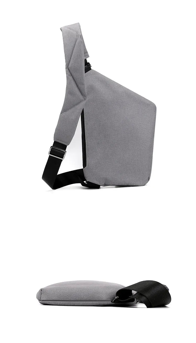 Sort mini crossbody rejsetaske, tyverisikker og praktisk for både mænd og kvinder.
