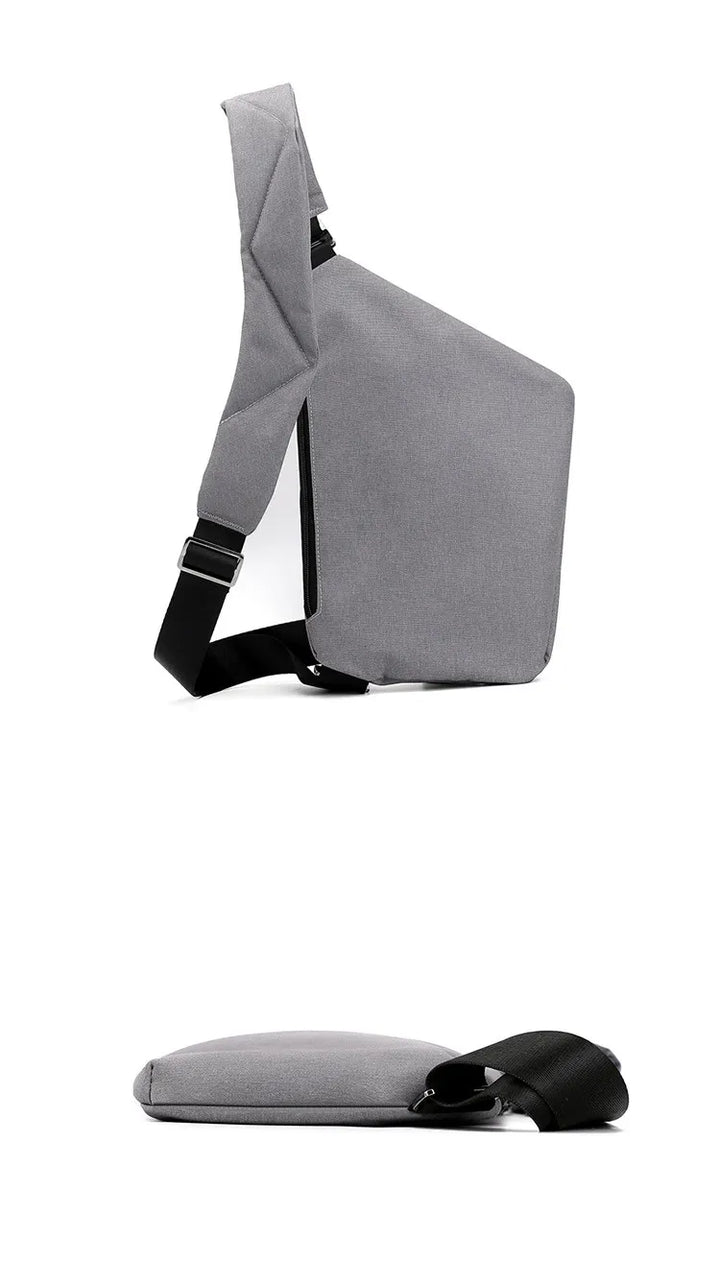 Sort mini crossbody rejsetaske, tyverisikker og praktisk for både mænd og kvinder.