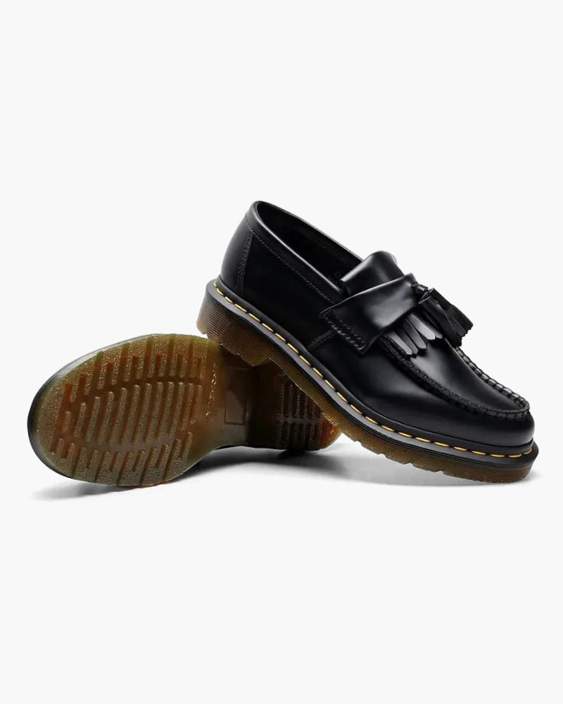 Elegante, men edgy, sorte chunky loafers til kvinder med frynser og platformsål, et must-have til efteråret.