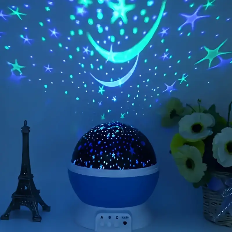 Stjerneprojektor Natlampe Luna projicerer farverig stjernehimmel, skaber magisk atmosfære i børneværelset.