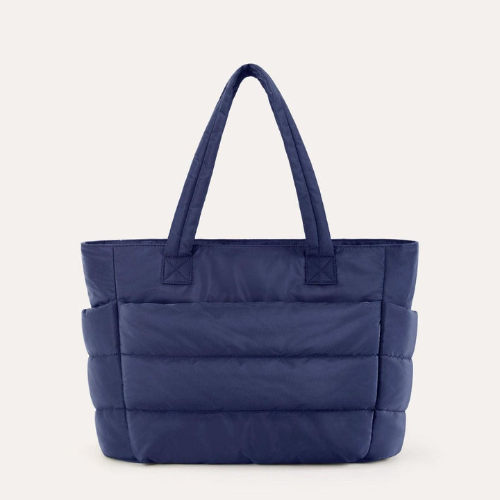 Dame taske med polstret design, der giver et unikt og stilfuldt look.