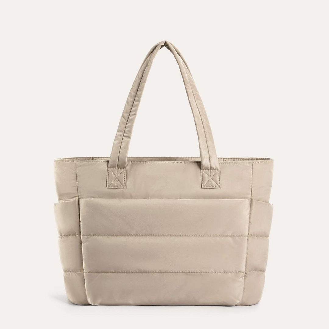 Trendy dame tote taske i en beroligende farve, perfekt til den modebevidste kvinde.
