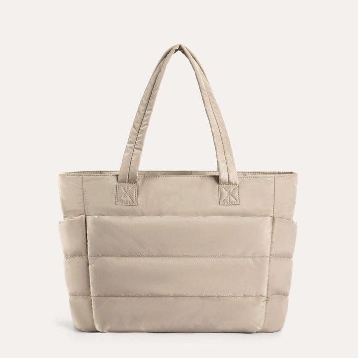 Trendy dame tote taske i en beroligende farve, perfekt til den modebevidste kvinde.