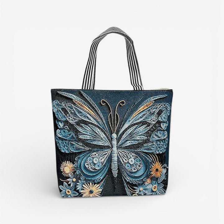 Afslappet shoppingtaske til damer med broderi og rummelig design. Perfekt fritidstaske.