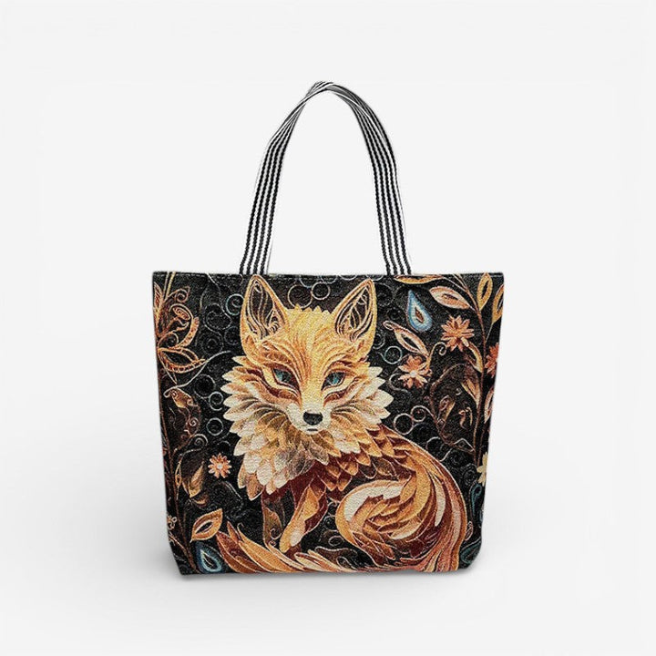 Praktisk tote taske til damer med broderi og stilfuldt struktureret look. Til den organiserede.